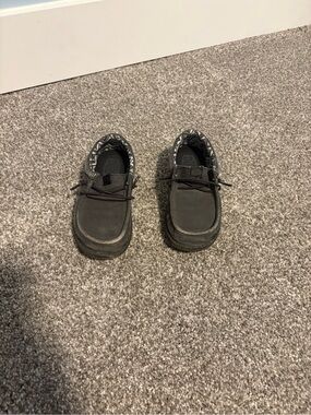 Hey Dude Black Slip-On Shoes with Gray Chevron Lining